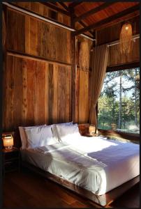 Ένα ή περισσότερα κρεβάτια σε δωμάτιο στο Balana HaGiang +92 φωτογραφίες