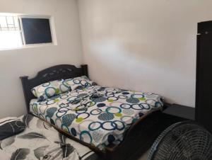 Giường trong phòng chung tại La casa de la abuela cartagena