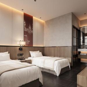 Ένα ή περισσότερα κρεβάτια σε δωμάτιο στο PingyaoSongshengchangHote +76 φωτογραφίες