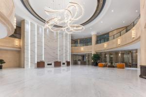 Khu vực sảnh/lễ tân tại Royalton Hotel Hefei USTC