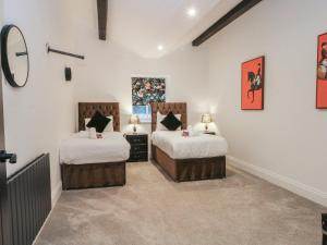 Ένα ή περισσότερα κρεβάτια σε δωμάτιο στο 7 Holly Barn