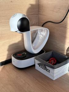 a weird looking toilet sitting on top of a table at T&H center Sliven in Sliven