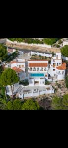 an aerial view of a large white building at Casa mimo units altea in Altea