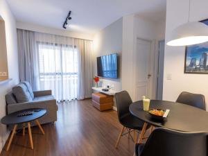 Телевизор и/или развлекательный центр в Mercure Sao Paulo Berrini