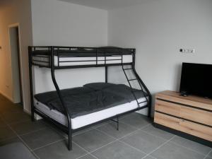 Ένα ή περισσότερα κρεβάτια σε δωμάτιο στο Herrnsheim Appartements