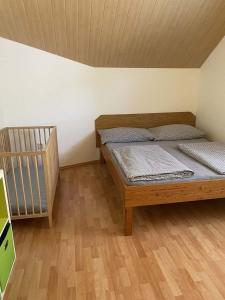Postel nebo postele na pokoji v ubytování Rekreační dům Strachotín