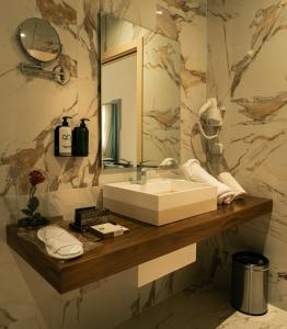 Koupelna v ubytování Le Royal Plaza