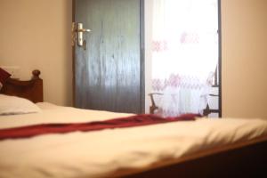 Ένα ή περισσότερα κρεβάτια σε δωμάτιο στο Sea side nest +20 φωτογραφίες