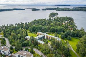 an aerial view of a train station on an island in the water at Hotel Jollasranta Helsinki in Helsinki +9 photos