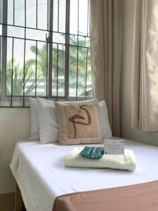 Ένα ή περισσότερα κρεβάτια σε δωμάτιο στο The Hausévo Transient House 3BR