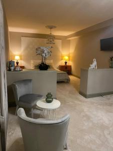 Μια τηλεόραση ή/και κέντρο ψυχαγωγίας στο Chambre de La Demeure des Monts de Gy