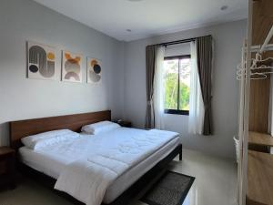 Ένα ή περισσότερα κρεβάτια σε δωμάτιο στο Nirvana Phangan 1 +10 φωτογραφίες