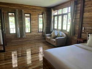 Postel nebo postele na pokoji v ubytování Freedom villa kohjum