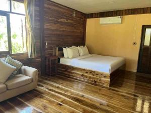 Postel nebo postele na pokoji v ubytování Freedom villa kohjum