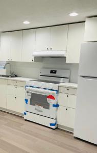 Kuchyň nebo kuchyňský kout v ubytování Stylish and cozy private guesthouse