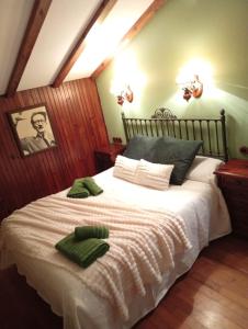 En eller flere senge i et værelse på A Casa da Rianxeira