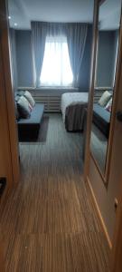 Ένα ή περισσότερα κρεβάτια σε δωμάτιο στο Mihailo hotel Andjela