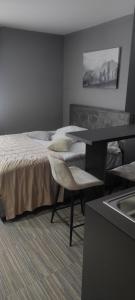 Ένα ή περισσότερα κρεβάτια σε δωμάτιο στο Mihailo hotel Andjela