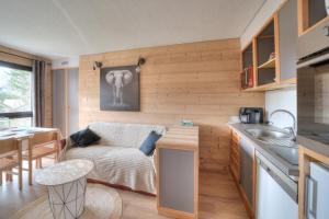 Η κουζίνα ή μικρή κουζίνα στο Chez Arnaud - Télésiège à 200 mètres +4 φωτογραφίες