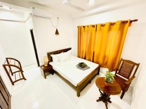 Ένα ή περισσότερα κρεβάτια σε δωμάτιο στο Arrow Beach Hotel