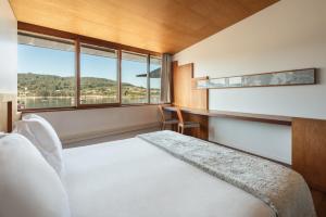 Postel nebo postele na pokoji v ubytování A casa de Aldán