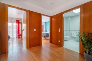 Ένα ή περισσότερα κρεβάτια σε δωμάτιο στο Casa da Bélgica