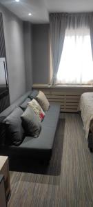 Ένα ή περισσότερα κρεβάτια σε δωμάτιο στο Mihailo hotel Andjela