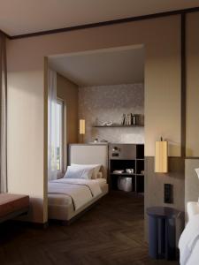 Ένα ή περισσότερα κρεβάτια σε δωμάτιο στο Hotel Schani City