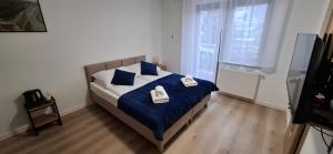 Postel nebo postele na pokoji v ubytování Willa Bianka