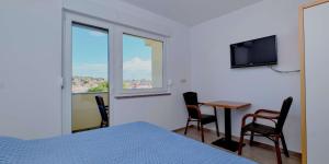 TV a/nebo společenská místnost v ubytování Complex 36