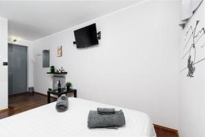 Postel nebo postele na pokoji v ubytování Sestriere - 200 mt dalle piste da sci - Monolocale