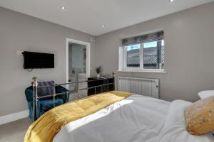 Ένα ή περισσότερα κρεβάτια σε δωμάτιο στο Roe Barn