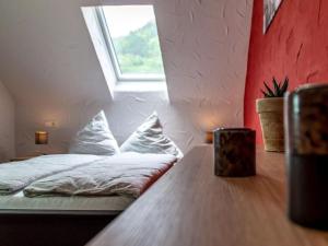 Ένα ή περισσότερα κρεβάτια σε δωμάτιο στο Holiday apartment Moselle valley