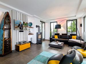 Фотография из галереи Penthouse 27 & SPA in Villa Mathilde в городе Бинц