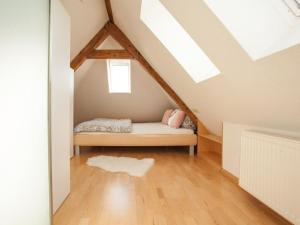 Ένα ή περισσότερα κρεβάτια σε δωμάτιο στο holiday apartment