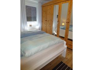 Ένα ή περισσότερα κρεβάτια σε δωμάτιο στο Anchorage Modern retreat