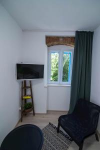 Μια τηλεόραση ή/και κέντρο ψυχαγωγίας στο Alice A1