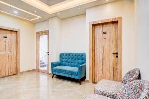 Khu vực ghế ngồi tại Super Townhouse Bhangagarh Bus Terminal Formerly The Rudra Inn