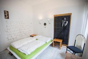 Voodi või voodid majutusasutuse Labyrinth Hostel Weimar toas