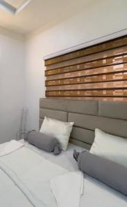 Ένα ή περισσότερα κρεβάτια σε δωμάτιο στο RockBnB Apartments Kaduna