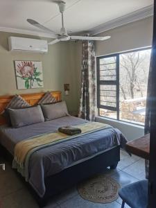 En eller flere senge i et værelse på Sonador Bush House + 73 billeder