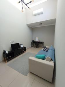 Et tv og/eller underholdning på Casa nova e aconchegante