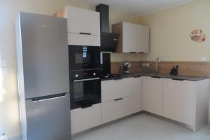 Η κουζίνα ή μικρή κουζίνα στο La Case Petite-Ile