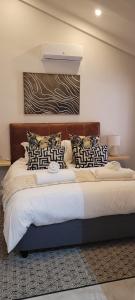 Ένα ή περισσότερα κρεβάτια σε δωμάτιο στο San Lameer Villa 2402 - 3 Bedroom Classic - 6 pax - San Lameer Rental Agency