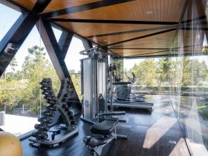 Phòng/tiện nghi tập thể dục tại Peaceful 2br Villa Grand Park Shared Pool Gym