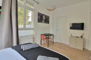 TV a/nebo společenská místnost v ubytování SC1 - Studio au RDC - Résidence Casino du Lac