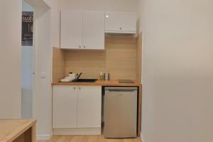 Kuchyň nebo kuchyňský kout v ubytování SC1 - Studio au RDC - Résidence Casino du Lac + 6 fotografií