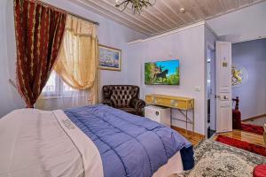 Un pat sau paturi într-o cameră la Theodoros Kolokotronis - Pandora