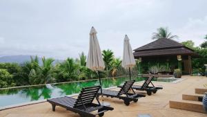 Φωτογραφία από το άλμπουμ του 普吉高端康养泳池别墅 σε Layan Beach