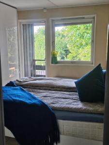 Ένα ή περισσότερα κρεβάτια σε δωμάτιο στο Oslo Hou 5 rooms